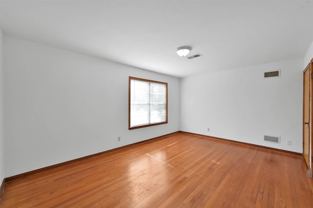 empty room featuring light hardwood / wood-style floors