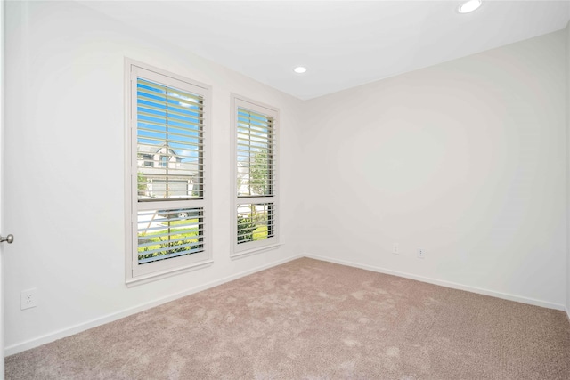 view of carpeted spare room