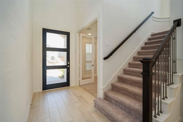 entrance foyer with light wood-type flooring