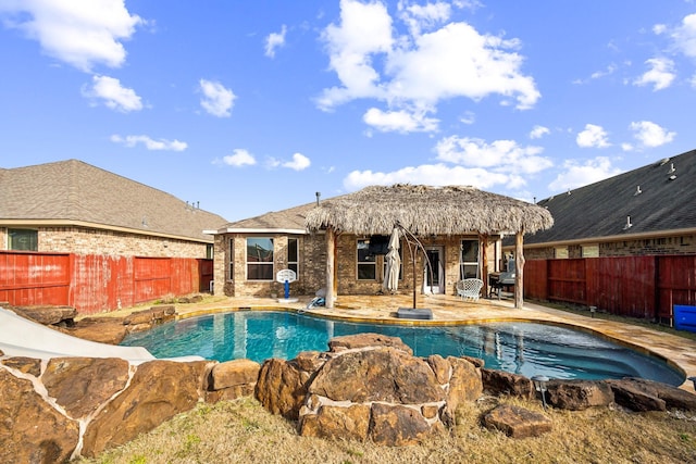 view of pool featuring a patio area