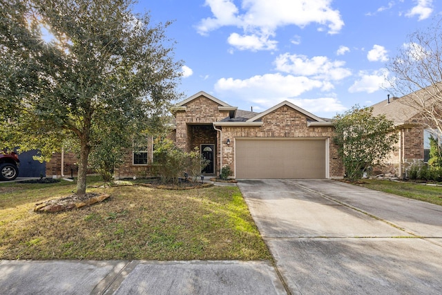 view of front of property with a garage and a front lawn