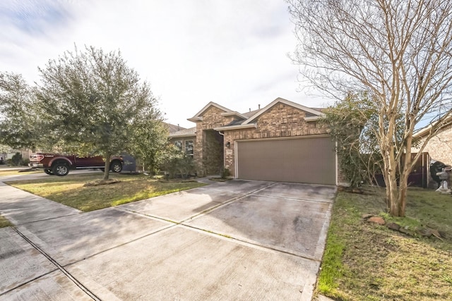 ranch-style home with a garage and a front yard