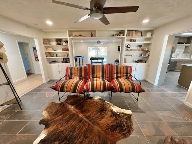 living room featuring built in shelves