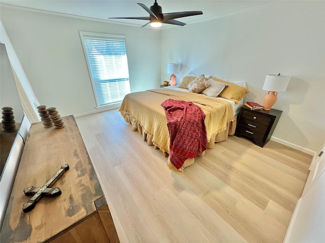 bedroom with ceiling fan and light wood-type flooring