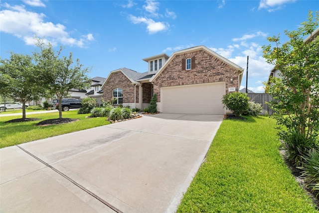 view of front facade featuring a garage and a front yard