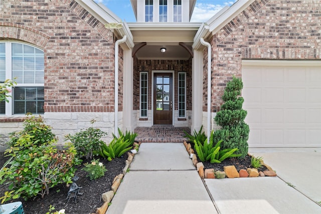 property entrance with a garage