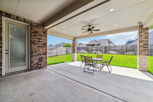 view of patio / terrace featuring ceiling fan