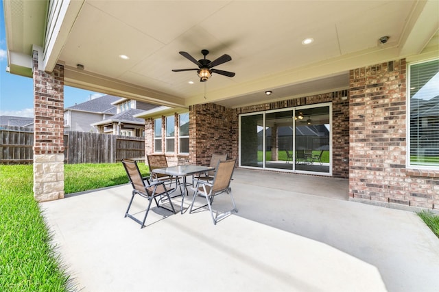 view of patio / terrace featuring ceiling fan