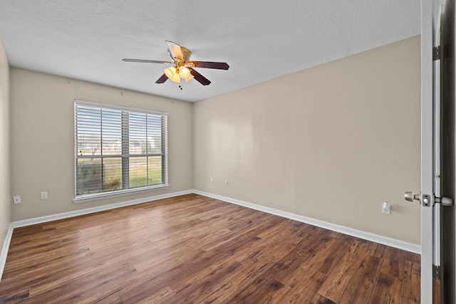 spare room with hardwood / wood-style flooring, ceiling fan, and a textured ceiling