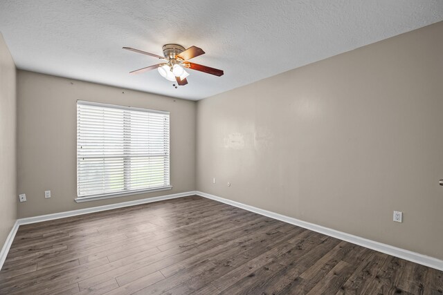 250 El Dorado Blvd Unit 127, Webster, TX 77598 - unfurnished room featuring ceiling fan, dark wood-style flooring, baseboards, and a textured ceiling