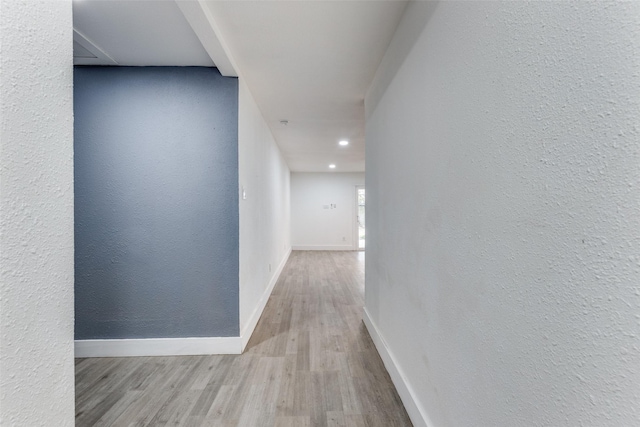 hall featuring light hardwood / wood-style flooring