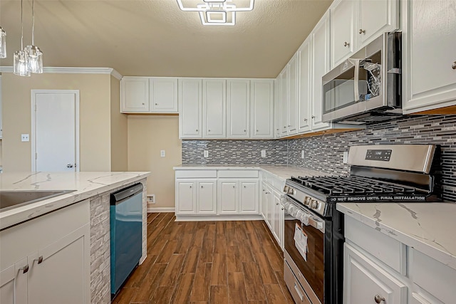 kitchen featuring pendant lighting, appliances with stainless steel finishes, dark hardwood / wood-style floors, light stone countertops, and white cabinets