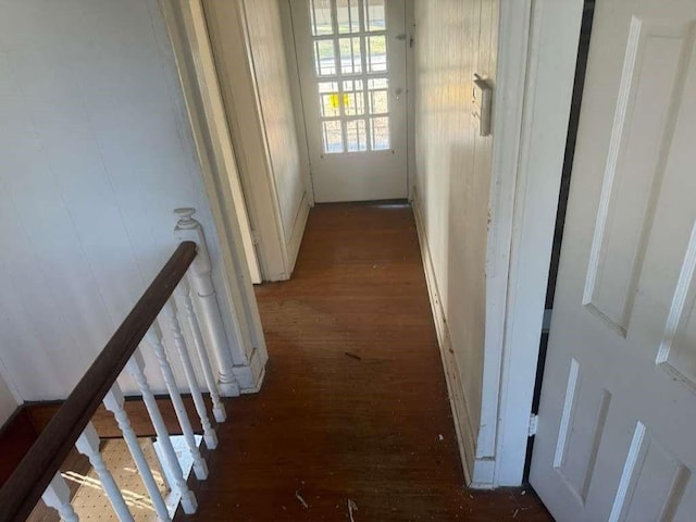 corridor featuring dark hardwood / wood-style floors