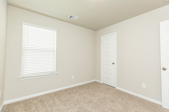 view of carpeted spare room