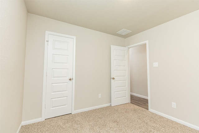 unfurnished bedroom featuring carpet floors