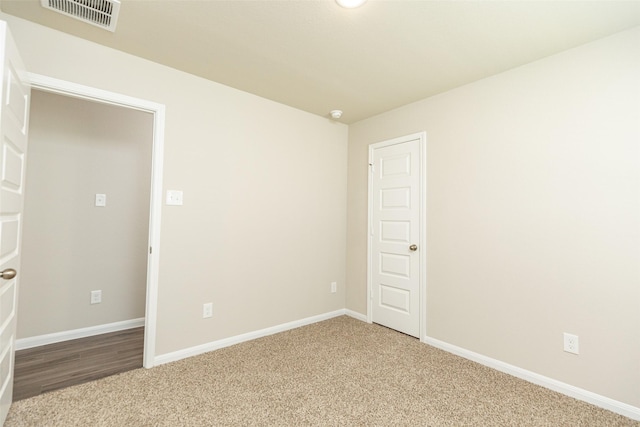 view of carpeted spare room