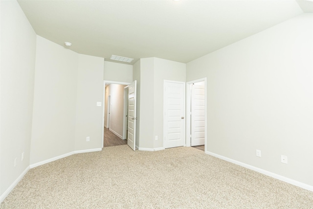 unfurnished bedroom featuring carpet flooring