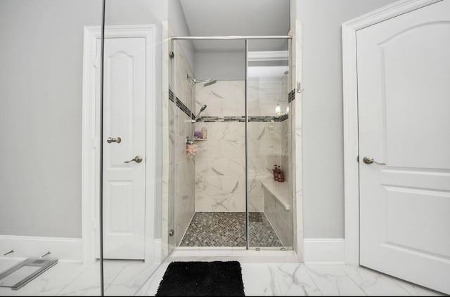 bathroom featuring a tile shower