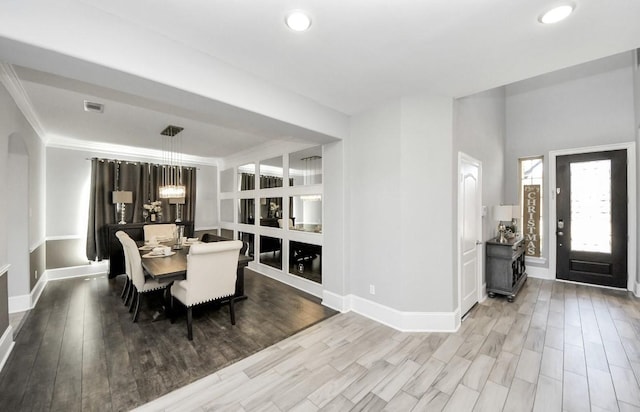 dining room featuring wood-type flooring