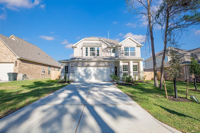 front of property with a garage and a front lawn