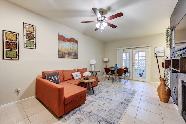 tiled living room with french doors and ceiling fan