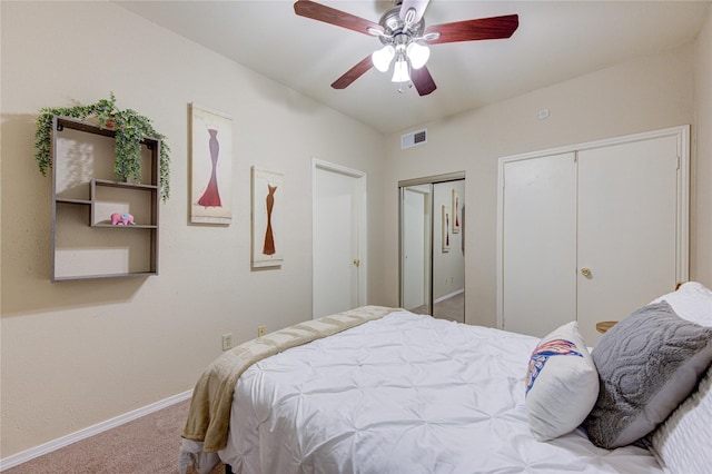 bedroom with ceiling fan and carpet floors