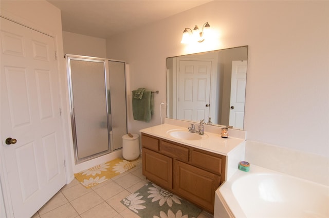 bathroom with vanity, plus walk in shower, and tile patterned flooring