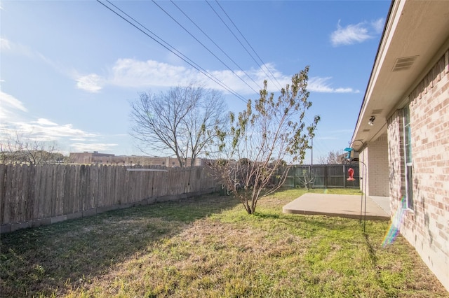 view of yard with a patio area