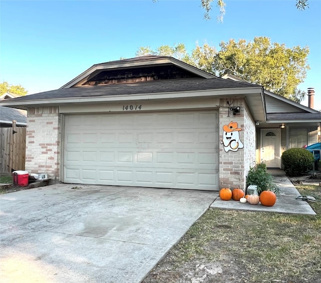 view of front of property featuring a garage