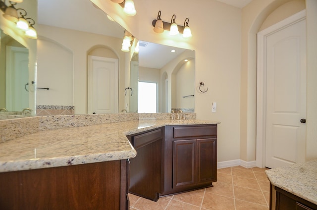 bathroom with vanity and tile patterned floors