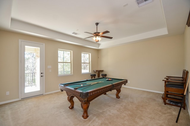 playroom with light carpet, pool table, a raised ceiling, and ceiling fan