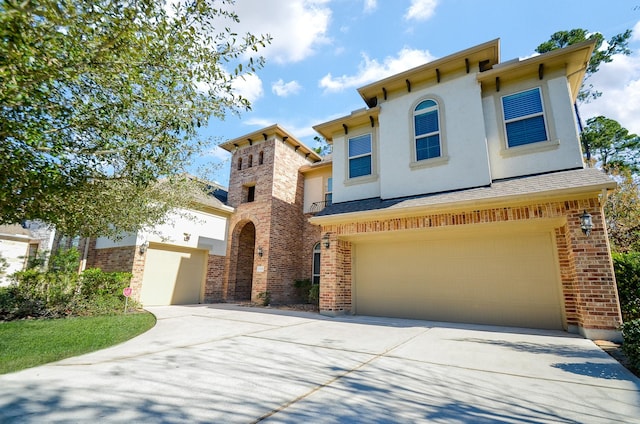 view of front of property featuring a garage