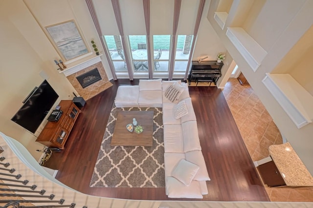 living room featuring hardwood / wood-style flooring and a fireplace