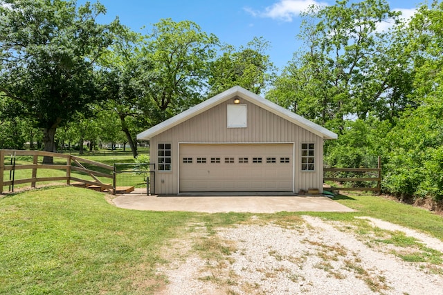 garage featuring a yard