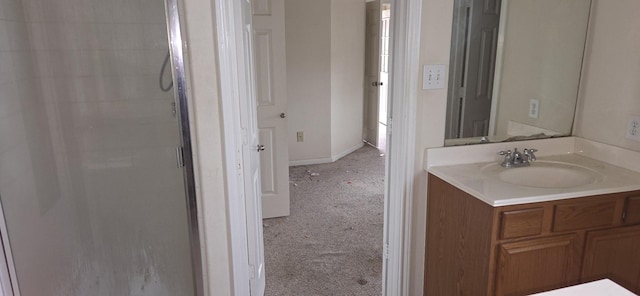 bathroom with vanity and walk in shower