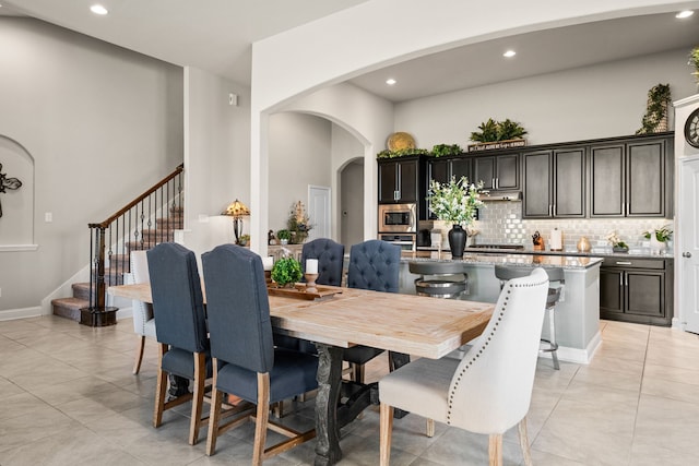 dining space with light tile patterned floors