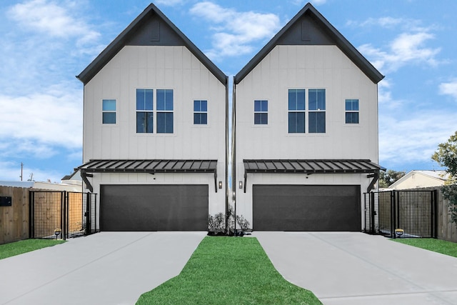 modern farmhouse style home featuring a garage