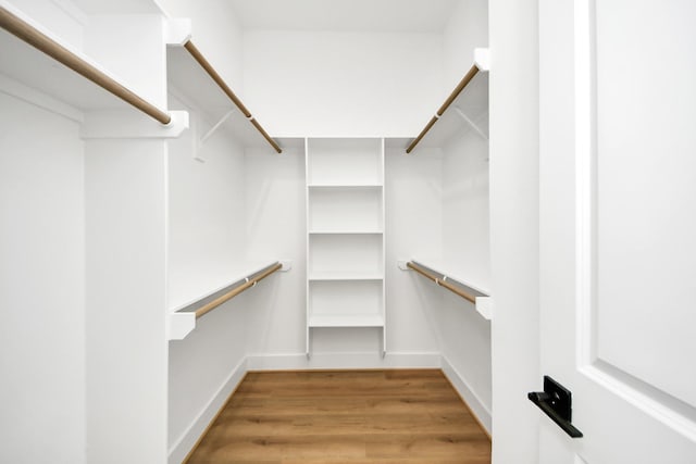 spacious closet with wood-type flooring