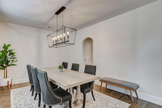 dining room with hardwood / wood-style flooring