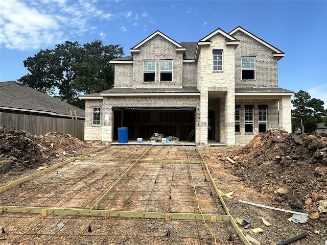 view of front of property with a garage