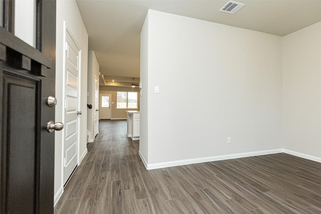 interior space with dark hardwood / wood-style flooring