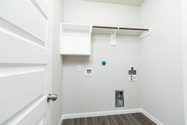 clothes washing area with dark wood-type flooring and washer hookup