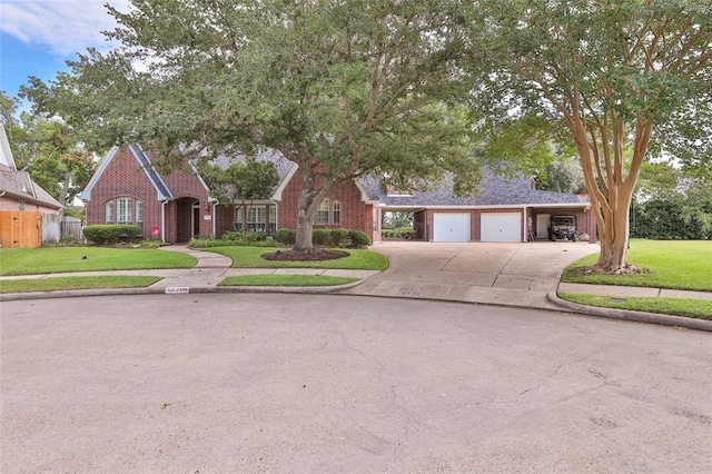 view of front facade with a garage and a front yard