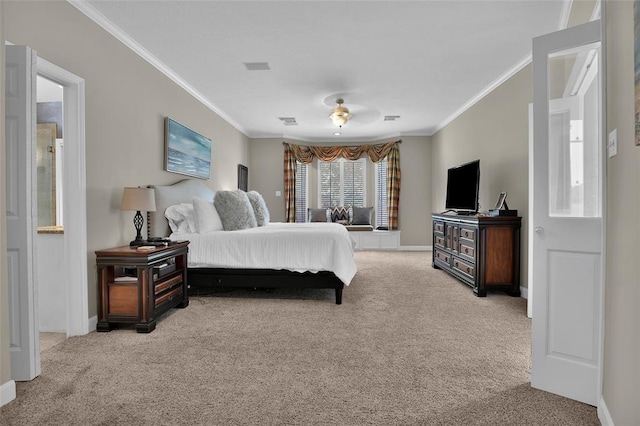 bedroom with crown molding and light carpet