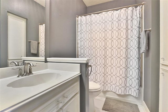 full bathroom with vanity, shower / bath combination with curtain, and toilet