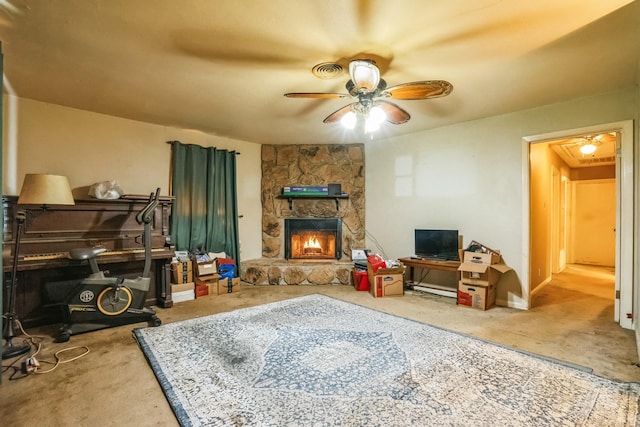 living room with a fireplace and ceiling fan