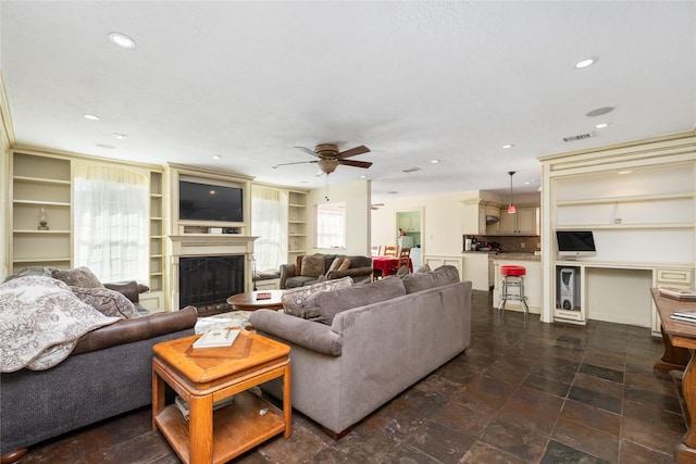 living room featuring ceiling fan