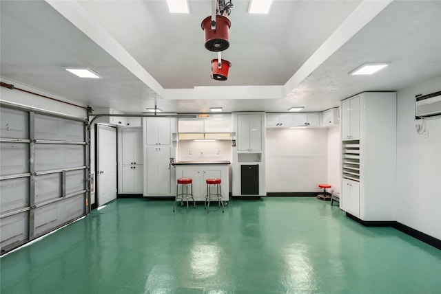 garage with a wall mounted AC