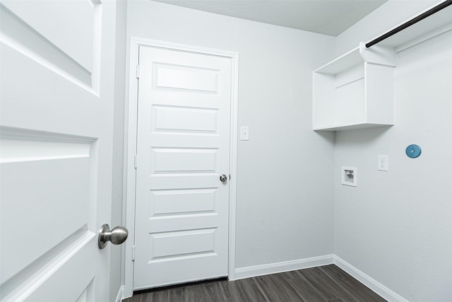 laundry area with dark wood-type flooring and hookup for a washing machine