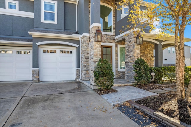 view of front of home with a garage